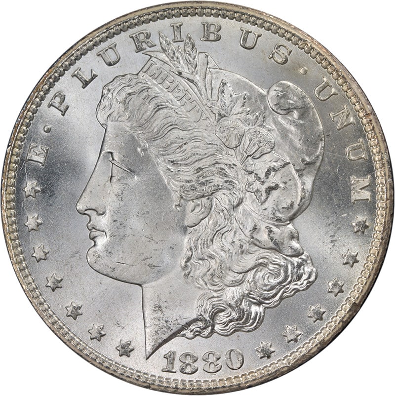 1880-CC GSA Morgan Silver Dollar CAC MS65 Uncirculated Coin: 1880-CC GSA Morgan Silver Dollar CAC MS65 Uncirculated Coin This exceptional 1880-CC GSA Morgan Silver Dollar features outstanding eye appeal, showcasing fantastic luster and a strong strike. The coin