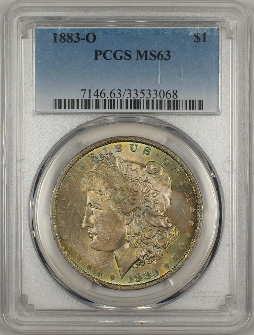PCGS MS63 1883-O Morgan Dollar Silver Coin With Obverse Toning: PCGS MS63 1883-O Morgan Dollar Silver Coin With Obverse Toning This is an 1883-O Morgan Silver Dollar $1 coin, certified by PCGS with an MS-63 grade. The coin features a nicely toned obverse and was m