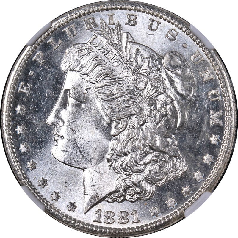 NGC MS65 1881-S Morgan Dollar Silver Gem Uncirculated: NGC MS65 1881-S Morgan Dollar Silver Gem Uncirculated This 1881-S Morgan Silver Dollar is certified by NGC with a grade of MS65. It is uncirculated and composed of silver with a fineness of 0.9. The c