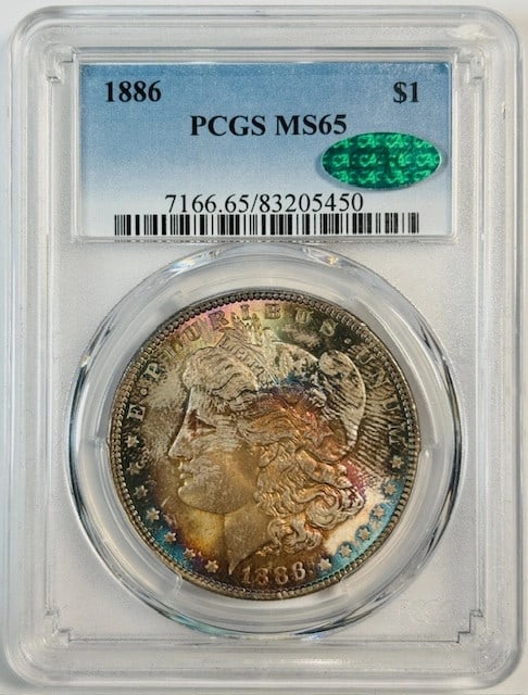PCGS CAC MS65 1886 Silver Dollar Philadelphia Mint Uncirculated: PCGS CAC MS65 1886 Silver Dollar Philadelphia Mint Uncirculated This 1886 Morgan Silver Dollar is certified by PCGS and CAC, graded MS 65. Struck in Philadelphia, this uncirculated coin is composed of