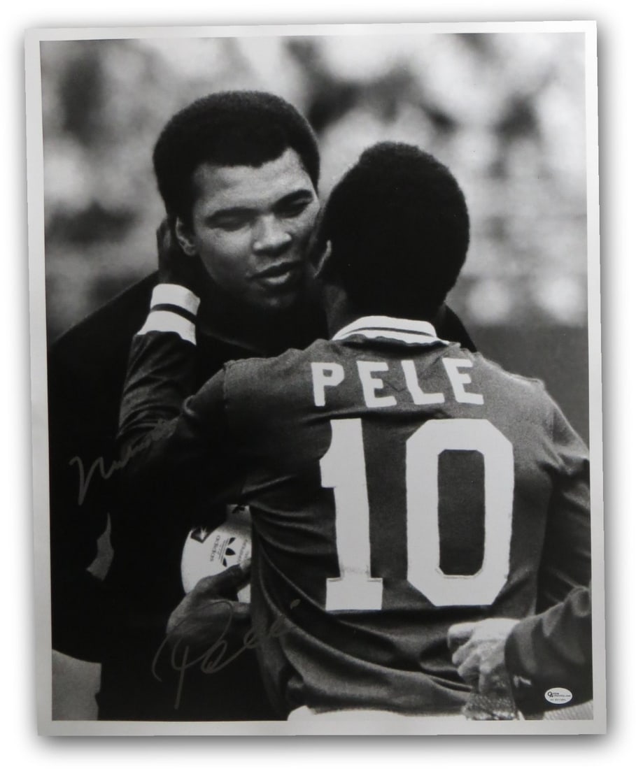 Muhammad Ali Pele Signed 16x20 Photo Authenticated by Online Authentics: Muhammad Ali Pele Signed 16x20 Photo Authenticated by Online Authentics This is a stunning 16X20 photo capturing the iconic moment of Muhammad Ali and Pele embracing, both legends in their respective
