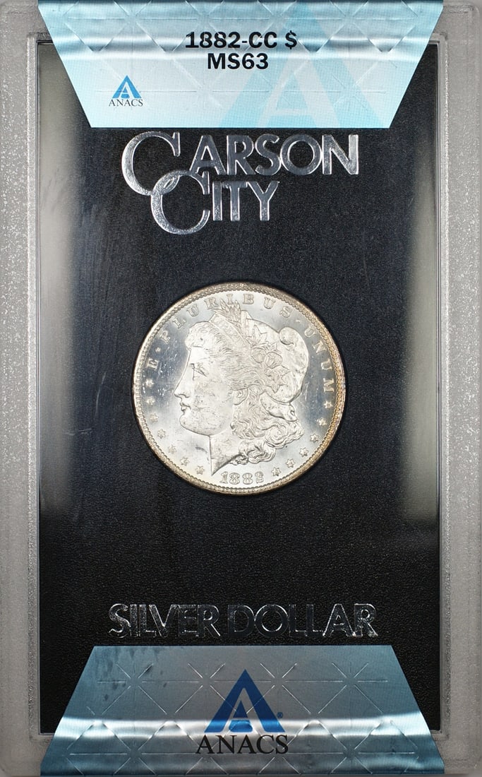 ANACS MS-63 1882-CC Morgan Dollar from GSA Hoard with Box and COA: ANACS MS-63 1882-CC Morgan Dollar from GSA Hoard with Box and COA This 1882-CC Morgan Silver Dollar is part of the GSA Hoard and has been certified by ANACS with a grade of MS-63. Minted in Carson Cit