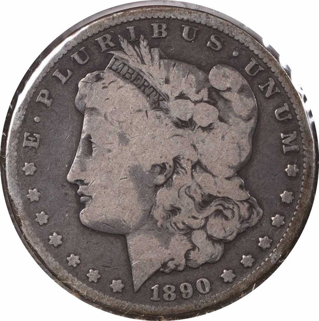 VG 1890 Carson City Morgan Dollar Tail Bar Variety Uncertified Silver Coin: VG 1890 Carson City Morgan Dollar Tail Bar Variety Uncertified Silver Coin This 1890-CC Morgan Silver Dollar is a circulated coin minted in Carson City. Composed of 90% silver and 10% copper, this coi