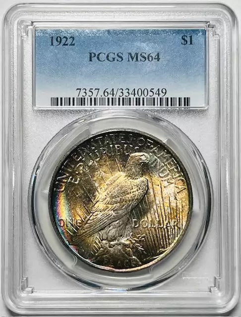 1922 P Peace Dollar PCGS MS-64 Uncirculated Silver with Toning: 1922 P Peace Dollar PCGS MS-64 Uncirculated Silver with Toning This 1922 P Peace Dollar is certified by PCGS with a remarkable grade of MS 64, showcasing stunning toning that adds character to this un