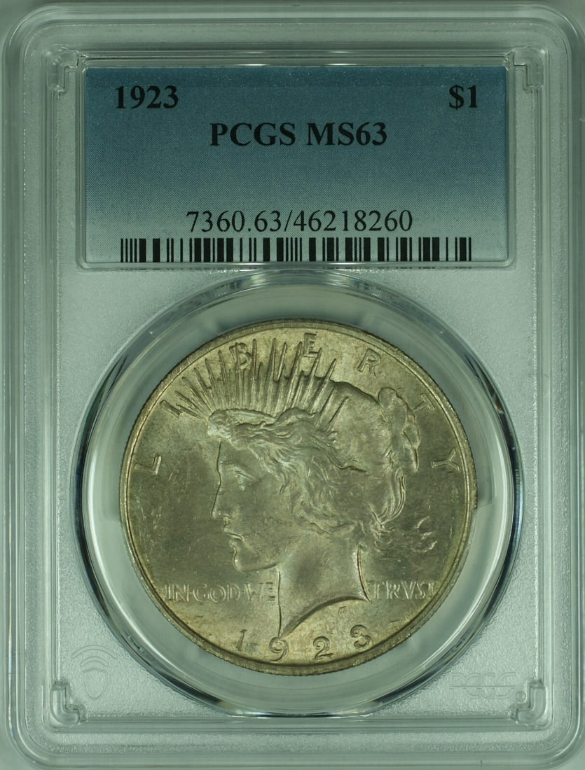 1923 Peace Dollar Silver Coin PCGS MS 63 Philadelphia With Toning: 1923 Peace Dollar Silver Coin PCGS MS 63 Philadelphia With Toning This is a 1923 Peace Silver Dollar from the United States, certified by PCGS with a grade of MS-63. The coin is uncirculated and featu