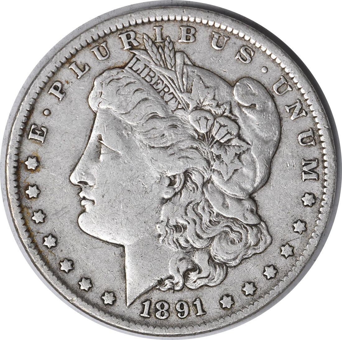 1891 Morgan Silver Dollar XF George T Morgan Uncertified: 1891 Morgan Silver Dollar XF George T Morgan Uncertified This 1891 Morgan Silver Dollar is a classic collectible coin featuring the iconic design by George T. Morgan. Struck in Philadelphia, this coin