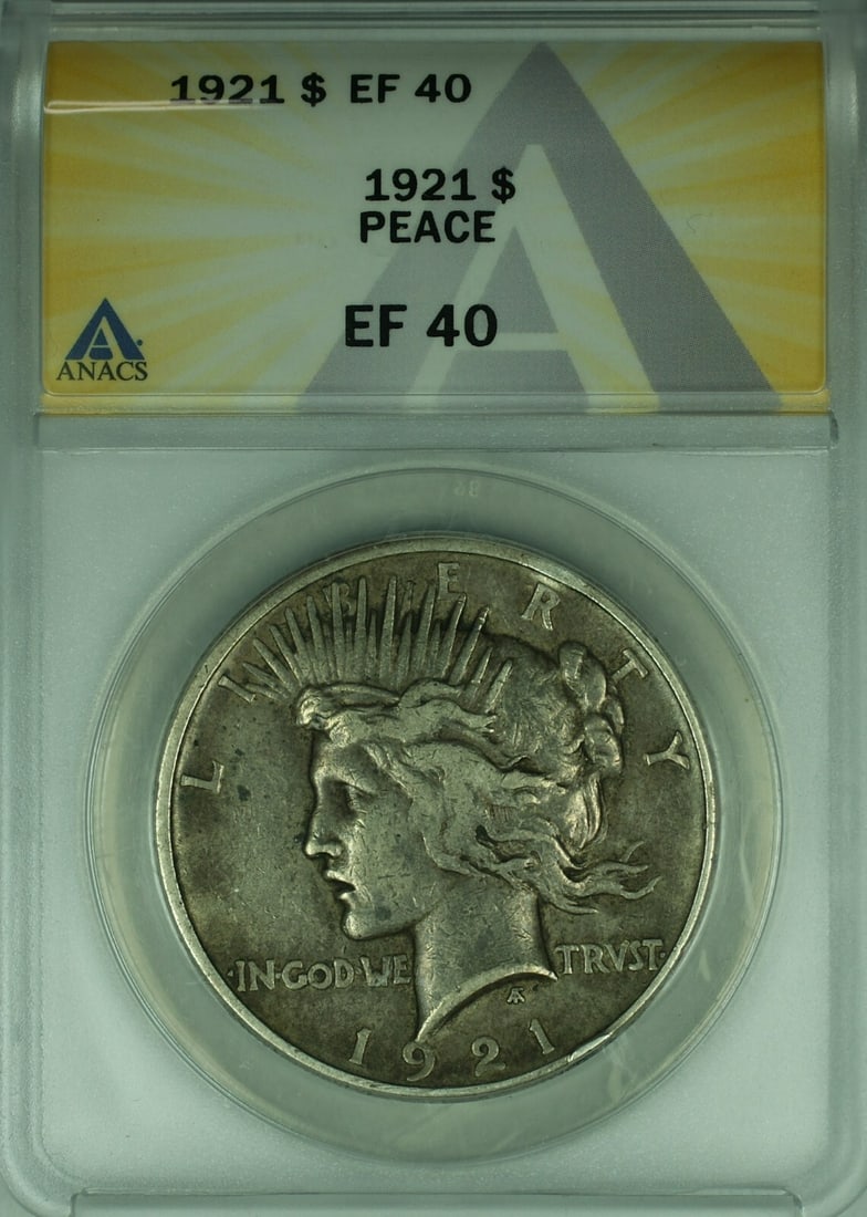 ANACS EF-40 1921 Peace Dollar Silver Coin Philadelphia Mint: ANACS EF-40 1921 Peace Dollar Silver Coin Philadelphia Mint This is a 1921 Peace Silver Dollar graded EF-40 by ANACS. Minted in Philadelphia, this circulated coin is composed of silver and has a denom