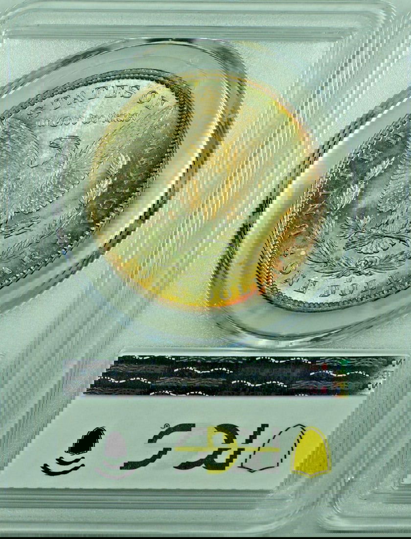 PCGS MS 63 Morgan Dollar 1884-O Silver Rainbow Toned $1 Coin: PCGS MS 63 Morgan Dollar 1884-O Silver Rainbow Toned $1 Coin This 1884-O Morgan Silver Dollar features a striking rainbow toning and is certified by PCGS with a grade of MS 63. Minted in the United St