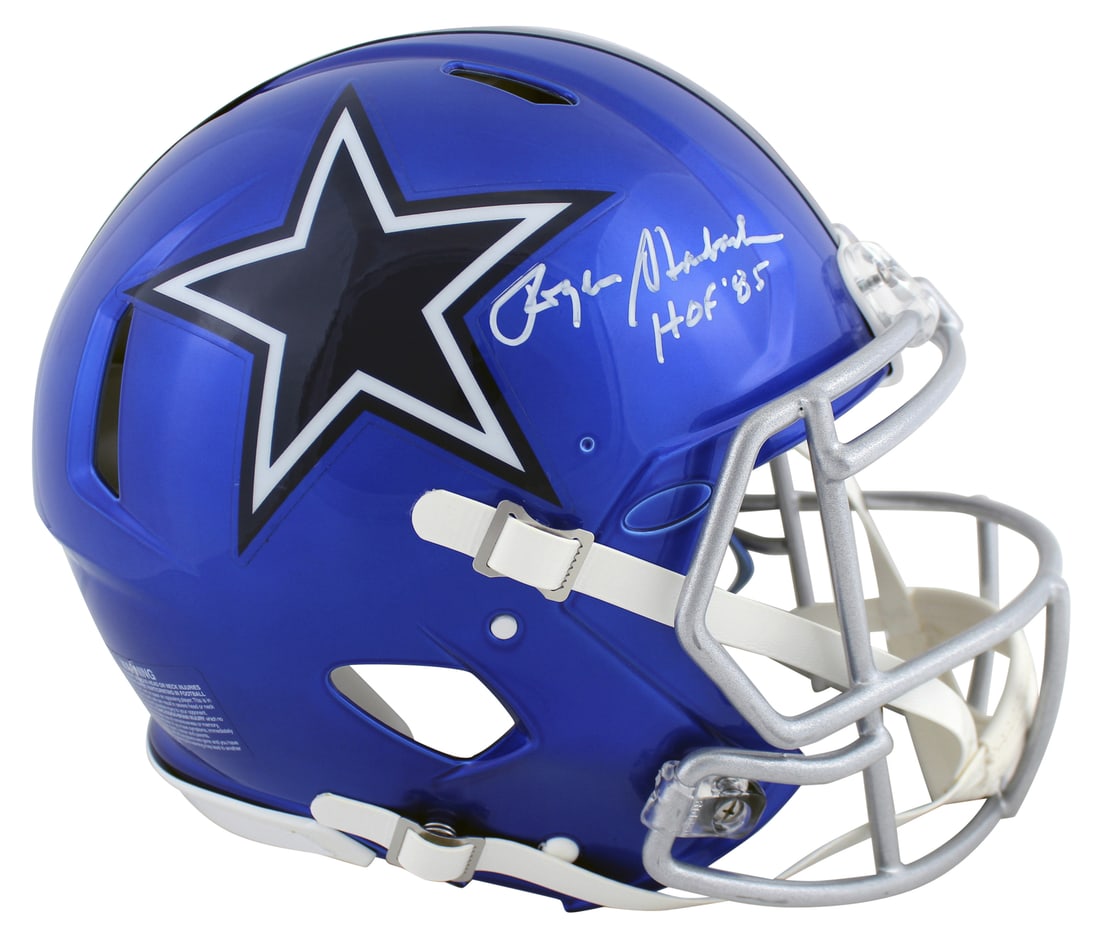 Roger Staubach Signed Dallas Cowboys Flash Helmet HOF 85 BAS: Roger Staubach Signed Dallas Cowboys Flash Helmet HOF 85 BAS Celebrate the legendary career of Roger Staubach with this autographed Dallas Cowboys Flash Full Size Speed Proline Helmet. This unique pie