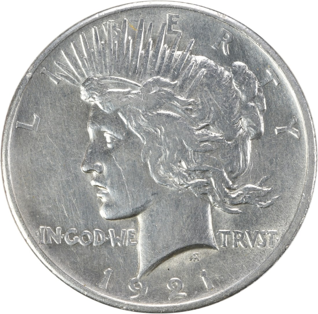 1921 Peace Dollar AU Grade Uncertified Philadelphia Mint Silver Coin: 1921 Peace Dollar AU Grade Uncertified Philadelphia Mint Silver Coin This 1921 Peace Silver Dollar from the Philadelphia Mint is composed of 90% silver and 10% copper. Designed by Anthony de Francisci