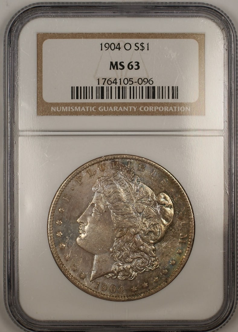 NGC MS-63 1904-O Morgan Silver Dollar Semi Proof-Like Toned Coin: NGC MS-63 1904-O Morgan Silver Dollar Semi Proof-Like Toned Coin This is a 1904-O Morgan Silver Dollar $1 coin from the United States, certified by NGC with a grade of MS 63. The coin is uncirculated