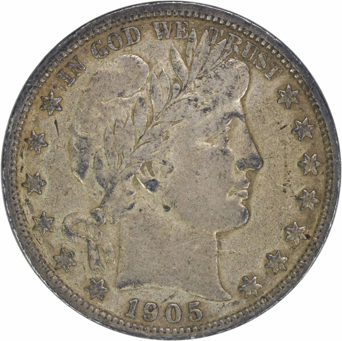 1905 Barber Half Dollar 50C Silver Coin Uncertified VF: 1905 Barber Half Dollar 50C Silver Coin Uncertified VF This 1905 Barber Silver Half Dollar is a beautifully crafted coin that showcases the artistry of designer Charles E. Barber. Struck in Philadelph
