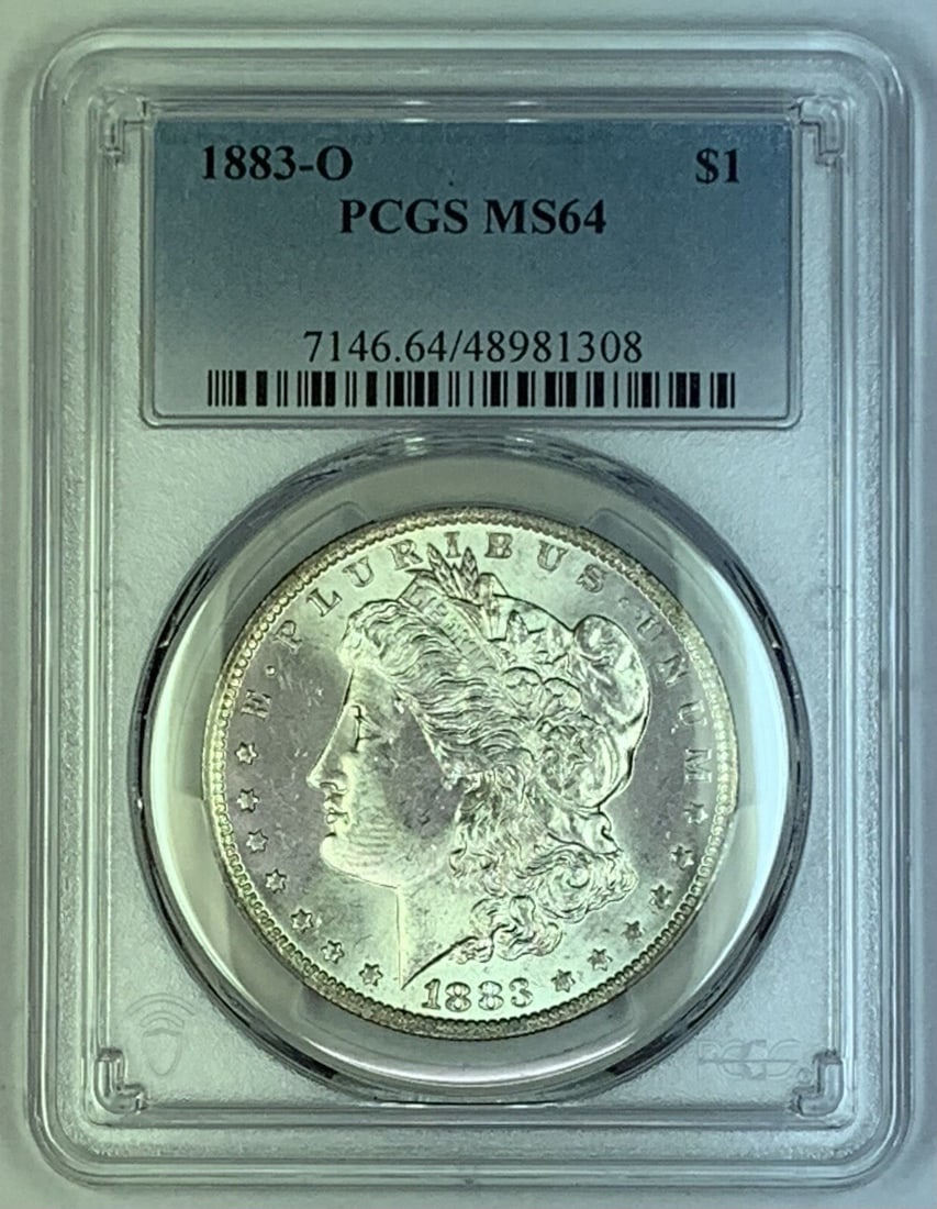 PCGS MS64 1883-O Morgan Silver Dollar Uncirculated US Coin: PCGS MS64 1883-O Morgan Silver Dollar Uncirculated US Coin This 1883-O Morgan Silver Dollar is an uncirculated coin graded MS 64 by PCGS. Minted in the United States, it features the iconic Morgan des