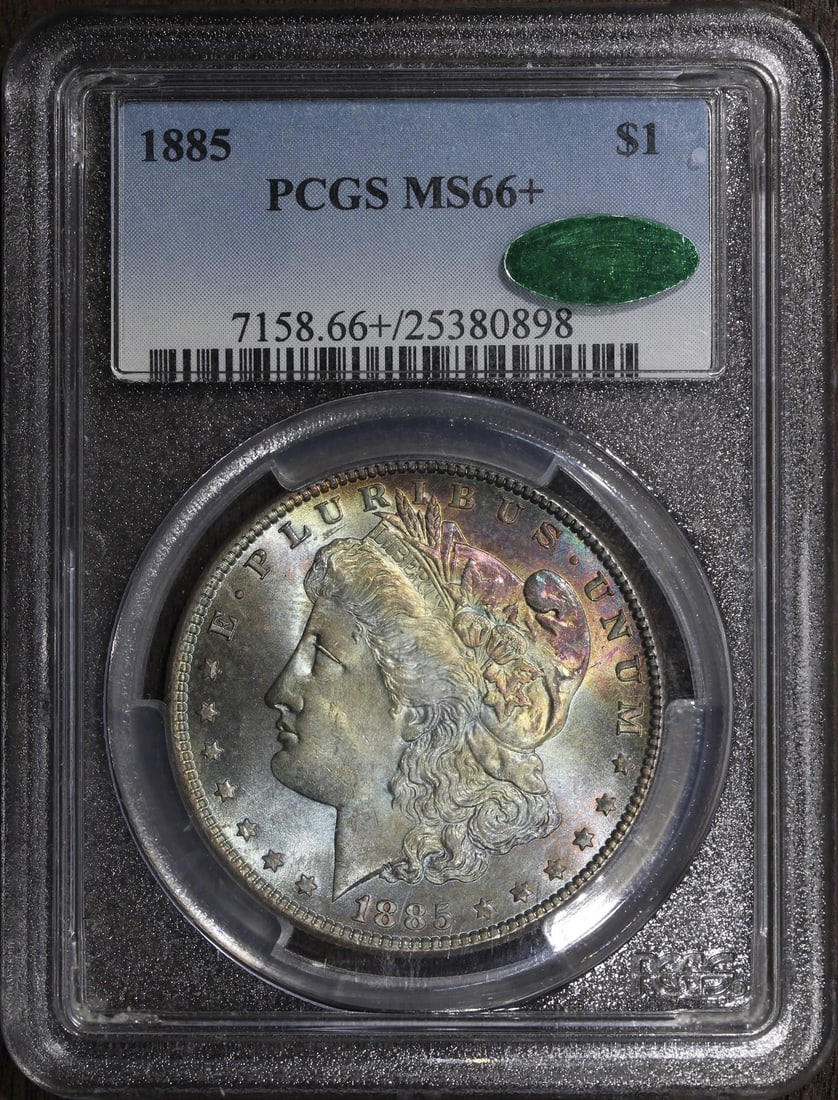 1885 Morgan Silver Dollar MS66+ CAC Rainbow Toned Gem PCGS: 1885 Morgan Silver Dollar MS66+ CAC Rainbow Toned Gem PCGS This stunning 1885 Morgan Silver Dollar is a remarkable piece for any numismatic collection. Graded MS66+ by PCGS and featuring a beautiful r