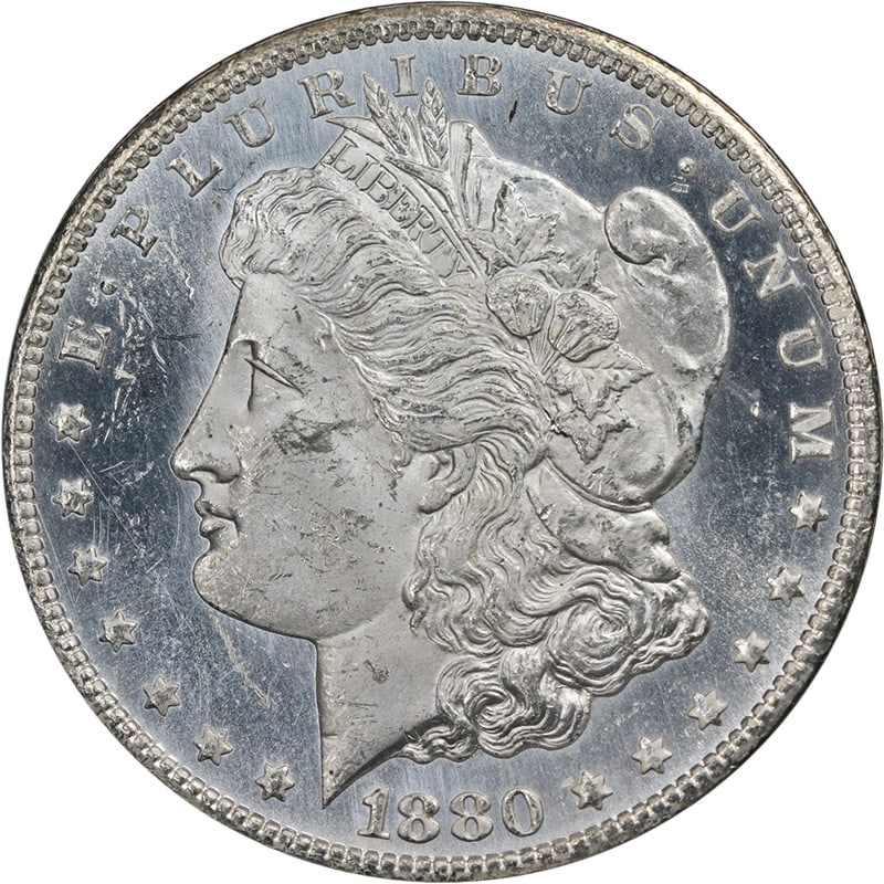 1880-CC GSA Morgan Silver Dollar NGC MS62 PL Blast White: 1880-CC GSA Morgan Silver Dollar NGC MS62 PL Blast White This original 1880-CC GSA Morgan Silver Dollar is a remarkable piece with exceptional eye appeal, showcasing fantastic luster and a strong stri