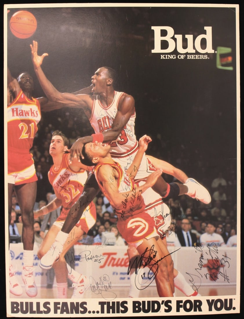Michael Jordan 1987-88 Bulls Team Signed 18x24 Budweiser Poster JSA COA: Michael Jordan 1987-88 Bulls Team Signed 18x24 Budweiser Poster JSA COA This rare 18" x 24" Budweiser poster captures a thrilling moment in basketball, featuring Michael Jordan driving the lane agains