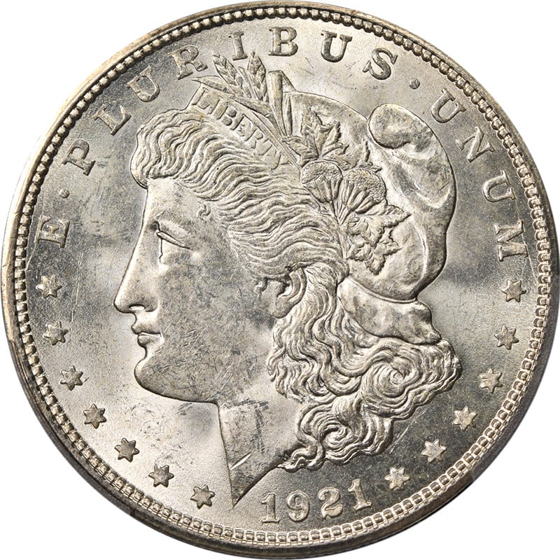 1921-D Morgan Silver Dollar PCGS MS64 Uncirculated Blast White: 1921-D Morgan Silver Dollar PCGS MS64 Uncirculated Blast White This stunning 1921-D Morgan Silver Dollar is certified by PCGS with a grade of MS64, showcasing remarkable eye appeal and a strong strike