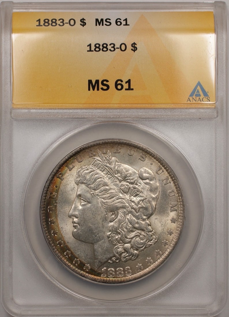 ANACS MS 61 1883-O Morgan Dollar Silver Coin With Rim Toning: ANACS MS 61 1883-O Morgan Dollar Silver Coin With Rim Toning This 1883-O Morgan Silver Dollar features rim toning and has been certified by ANACS with a grade of MS 61. Minted in New Orleans, it is co