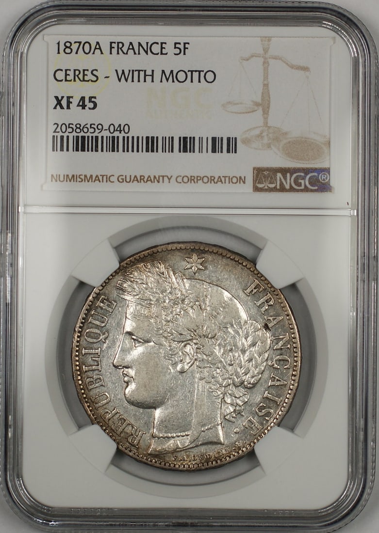 France 1870A Silver 5 Francs NGC XF 45 Ceres with Motto Coin: France 1870A Silver 5 Francs NGC XF 45 Ceres with Motto Coin This is an 1870A Ceres with Motto France 5 Francs silver coin, certified by NGC with a grade of XF 45. The coin is composed of silver and w