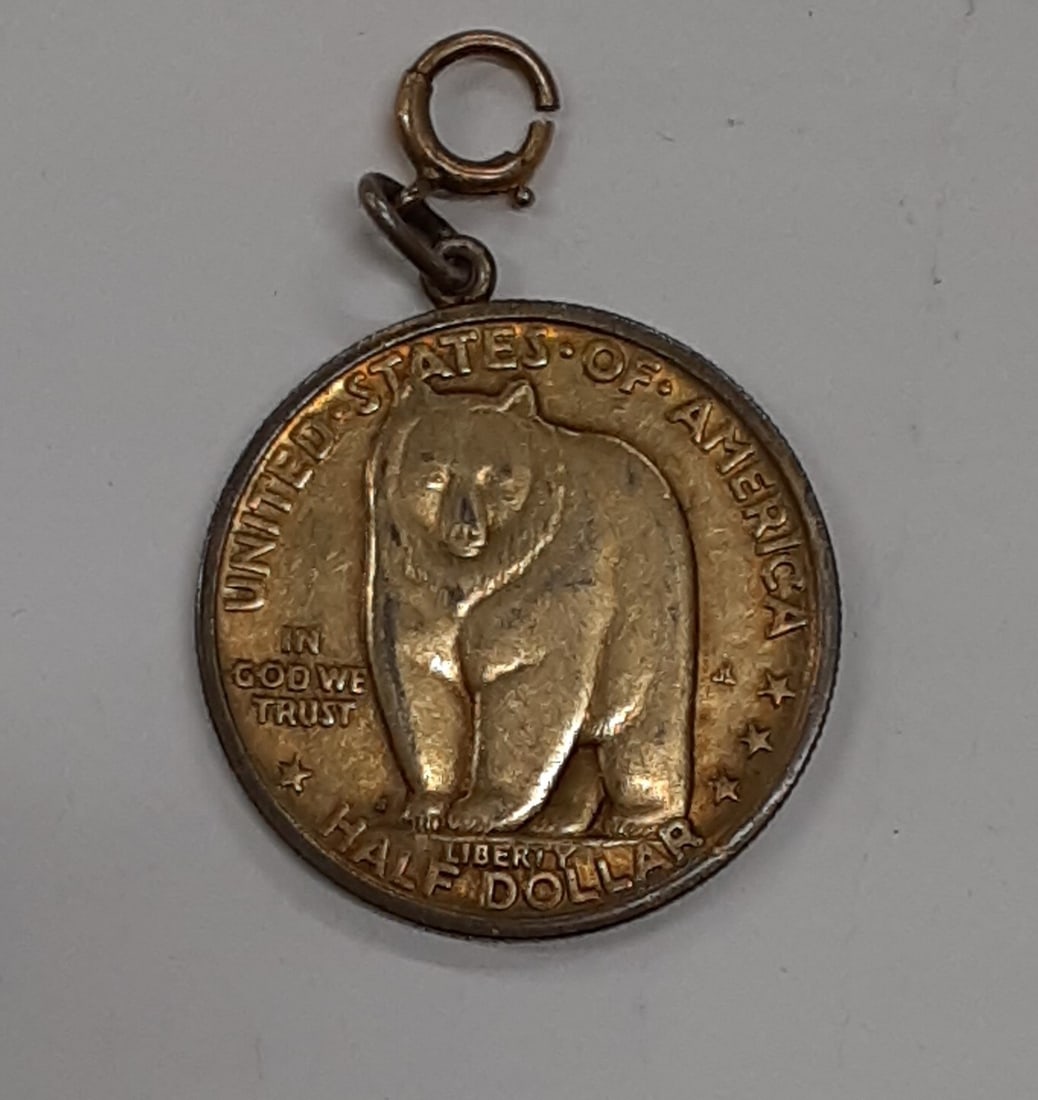 Silver 1936-S Bay Bridge Half Dollar Coin With Jewelry Loop Attachment: Silver 1936-S Bay Bridge Half Dollar Coin With Jewelry Loop Attachment This 1936-S Bay Bridge Commemorative Silver Half Dollar is a circulated coin featuring a loop for jewelry attachment. Minted in S