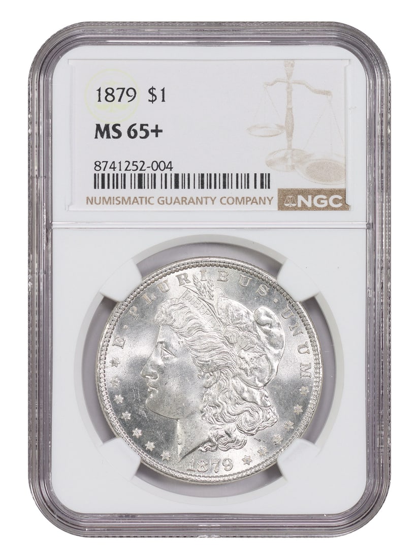 NGC Graded MS65 Plus 1879 Morgan Silver Dollar Coin: NGC Graded MS65 Plus 1879 Morgan Silver Dollar Coin This is an 1879 Morgan Dollar graded MS65+ by NGC. The coin is uncirculated and was minted in Philadelphia. It is part of the Morgan Dollar series a