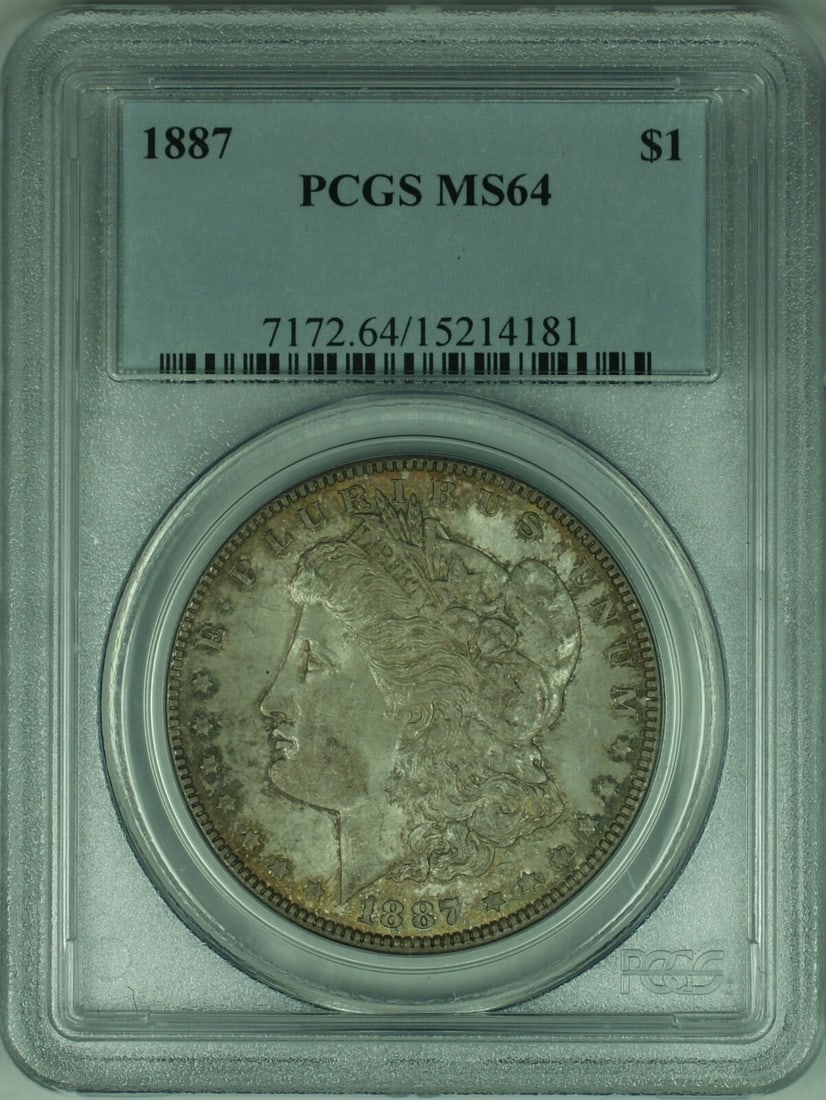 PCGS MS64 1887 Morgan Dollar Silver Coin with Toning: PCGS MS64 1887 Morgan Dollar Silver Coin with Toning This 1887 Morgan Silver Dollar is a $1 coin from the United States, certified by PCGS with a grade of MS64. Struck at the Philadelphia Mint, this u