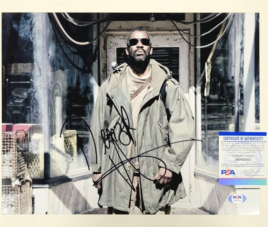 Denzel Washington Signed The Book of Eli 11x14 Photo PSA COA: Denzel Washington Signed The Book of Eli 11x14 Photo PSA COA This is an original photograph of Denzel Washington from 'The Book of Eli', measuring 11x14 inches. The photo features a full autograph sig