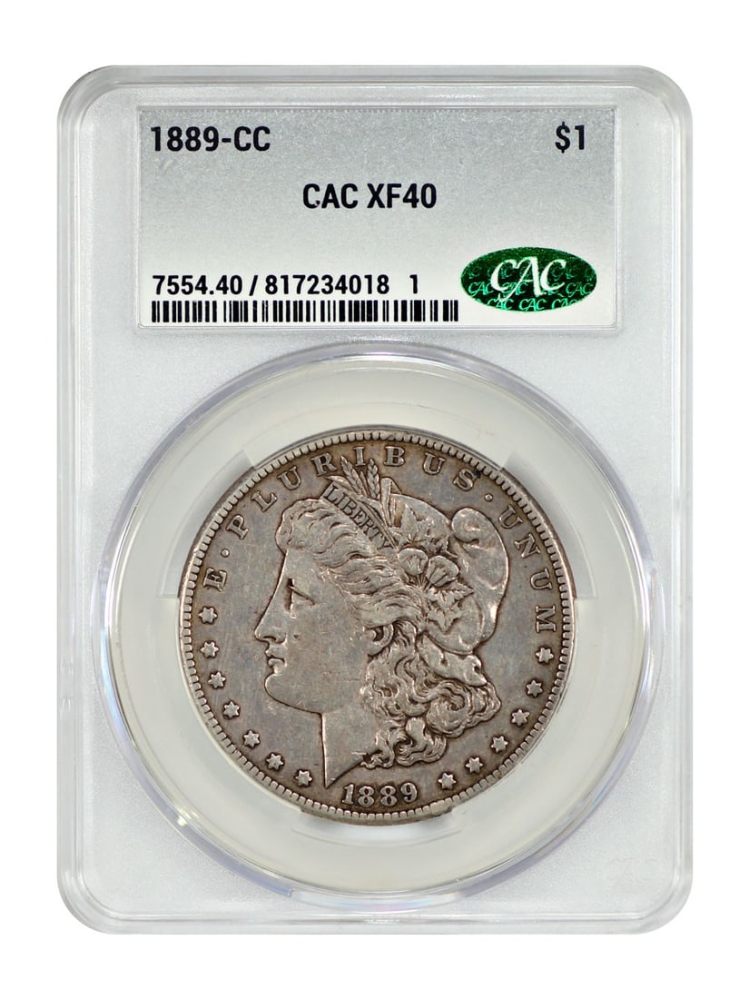 CACG XF40 1889 Carson City Key Date Morgan Silver Dollar: CACG XF40 1889 Carson City Key Date Morgan Silver Dollar This 1889-CC Morgan Dollar is a key date coin minted in Carson City and certified by CACG with a grade of XF40. Known as 'The King of the CCs,'