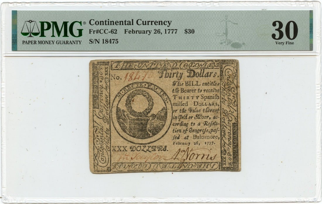 1777 $30 Continental Currency PMG VF30 Certified Baltimore: 1777 $30 Continental Currency PMG VF30 Certified Baltimore This $30 Continental Currency note, dated February 26, 1777, is a remarkable piece of American history. Certified by PMG with a grade of VF30