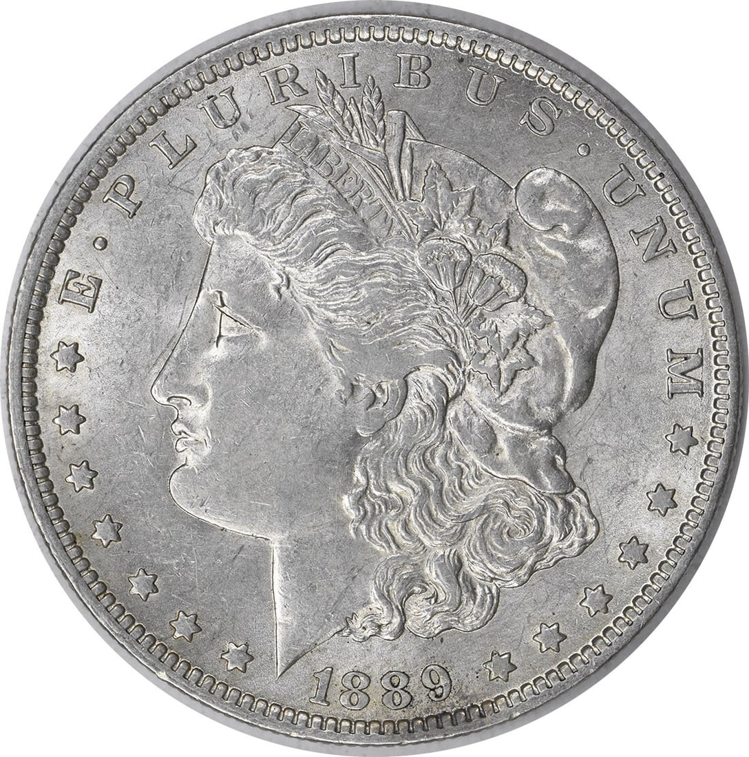 1889-O Morgan Silver Dollar AU Uncertified Coin by George T. Morgan: 1889-O Morgan Silver Dollar AU Uncertified Coin by George T. Morgan This 1889-O Morgan Silver Dollar features a striking design by George T. Morgan, showcasing a beautiful representation of liberty. T
