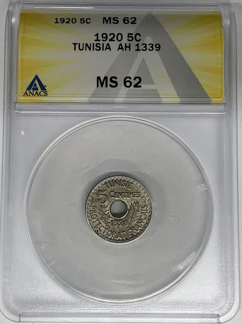 ANACS MS 62 Tunisia 1920 5 Centimes Certified Coin: ANACS MS 62 Tunisia 1920 5 Centimes Certified Coin This 1920 Tunisia 5 Centimes coin has been graded MS 62 by ANACS, indicating its mint state condition. It is a pre-owned collectible item from Tunisi