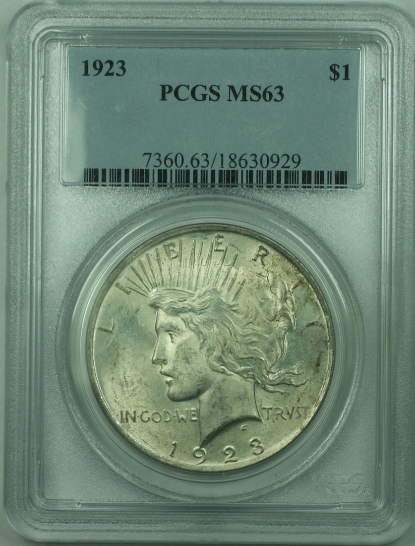 PCGS MS-63 1923 Peace Dollar Silver $1 Philadelphia Uncirculated Coin: PCGS MS-63 1923 Peace Dollar Silver $1 Philadelphia Uncirculated Coin This is a 1923 Peace Silver Dollar $1 coin certified by PCGS with a grade of MS-63. Minted in Philadelphia, this uncirculated coin