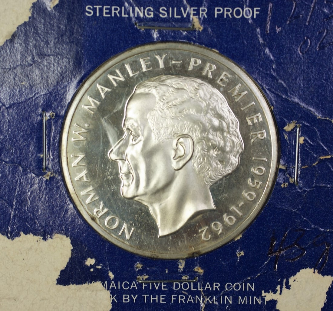 1973 Jamaica Sterling Silver $5 Coin Norman W Manley Premier Uncirculated: 1973 Jamaica Sterling Silver $5 Coin Norman W Manley Premier Uncirculated This 1973 Jamaica $5 coin honors Norman W. Manley, Premier from 1959 to 1962. Struck in sterling silver with a fineness of 0.9