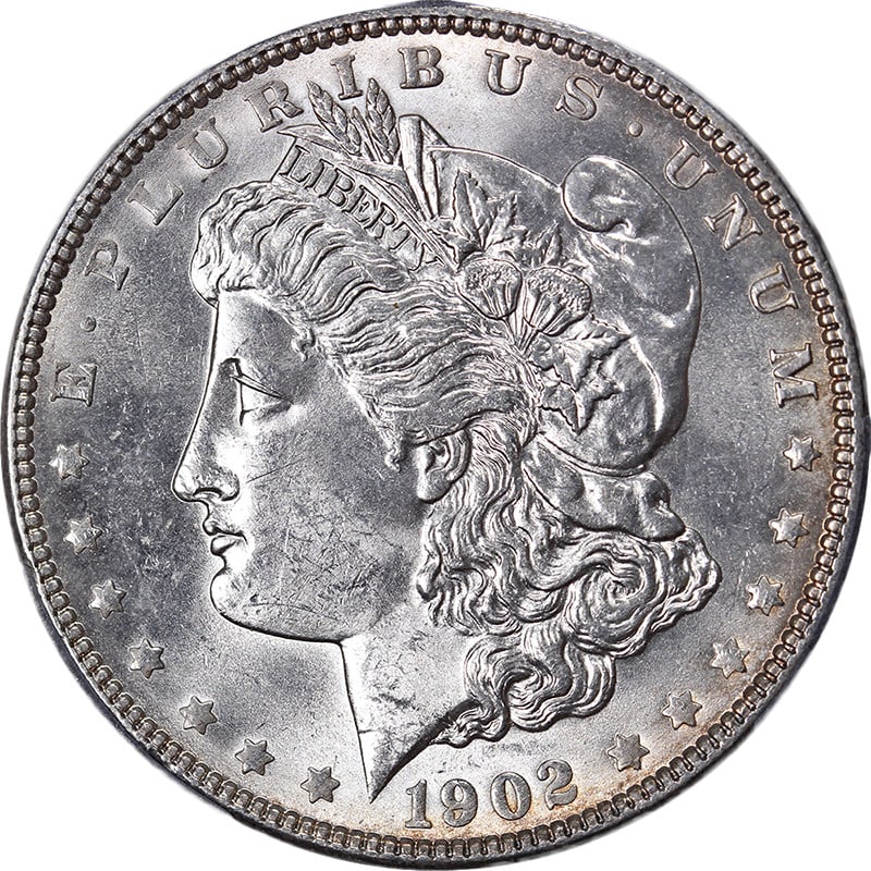 1902-P Morgan Silver Dollar PCGS MS63 Exceptional Eye Appeal: 1902-P Morgan Silver Dollar PCGS MS63 Exceptional Eye Appeal Introducing the stunning 1902-P Morgan Silver Dollar, certified by PCGS with a grade of MS63. This coin boasts exceptional eye appeal highl