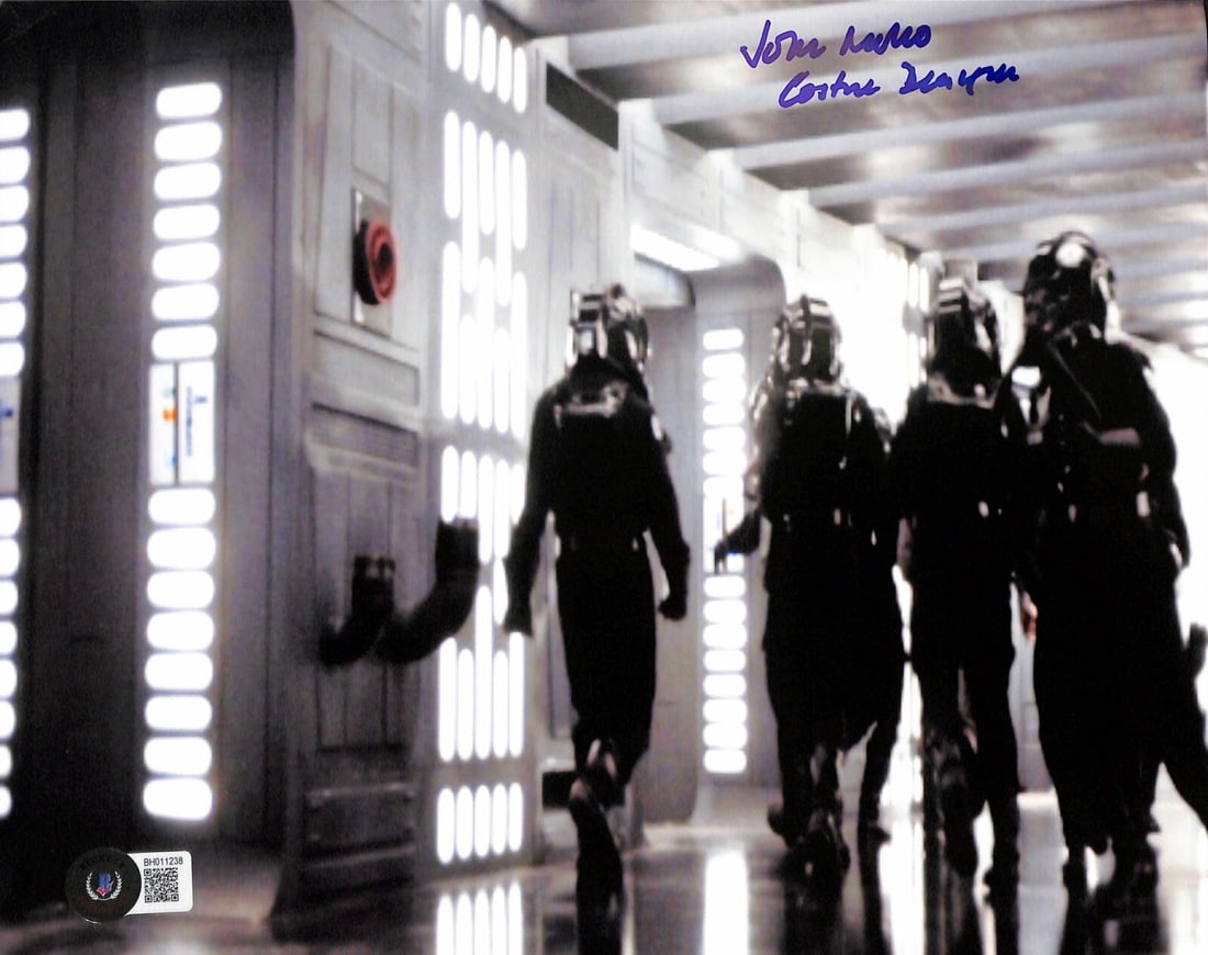 John Mollo Signed 8x10 Star Wars Photo Certified Beckett: John Mollo Signed 8x10 Star Wars Photo Certified Beckett This remarkable 8x10 photograph features the autograph of John Mollo, the esteemed costume designer behind the iconic looks in the original Sta