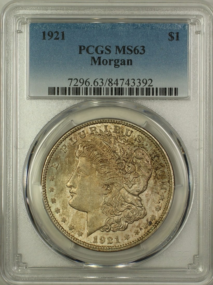 PCGS MS-63 1921 Morgan Dollar Silver $1 Coin Toned Uncirculated: PCGS MS-63 1921 Morgan Dollar Silver $1 Coin Toned Uncirculated This is a 1921 Morgan Silver Dollar $1 coin, certified by PCGS with a grade of MS-63. Struck at the Philadelphia Mint, the coin features