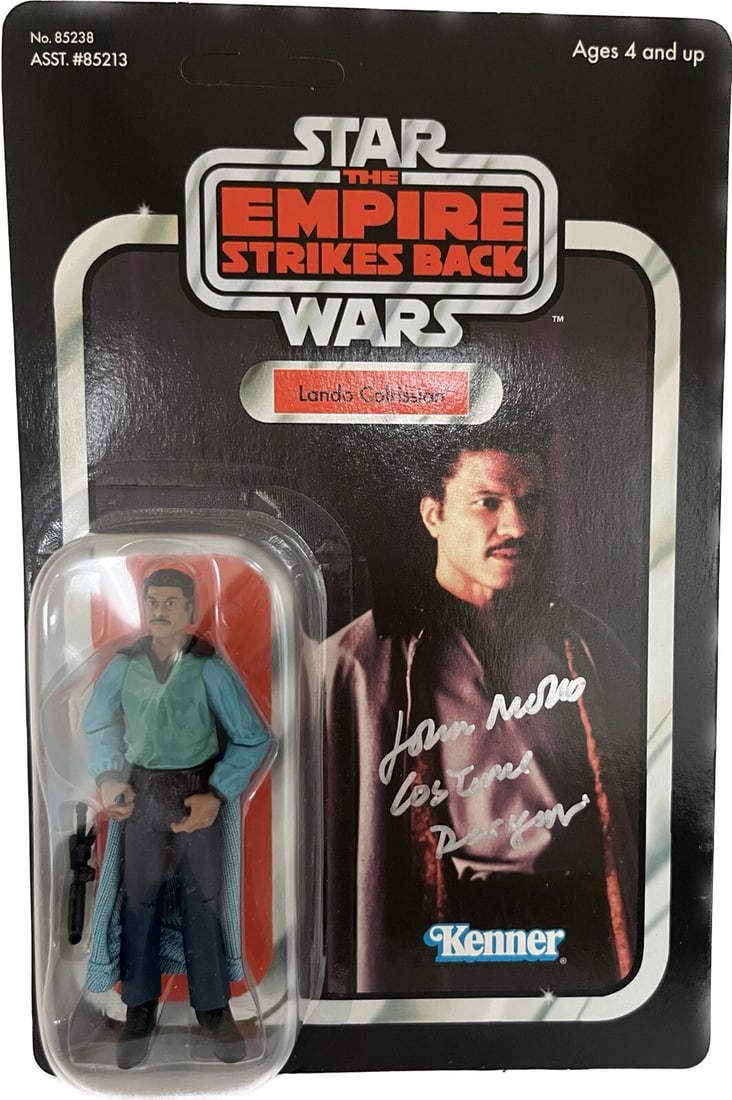 2004 Star Wars Lando Calrissian Action Figure Signed by John Mollo Beckett Authenticated: 2004 Star Wars Lando Calrissian Action Figure Signed by John Mollo Beckett Authenticated This 2004 Star Wars Original Trilogy Collection Lando Calrissian action figure is signed by John Mollo, the Osc