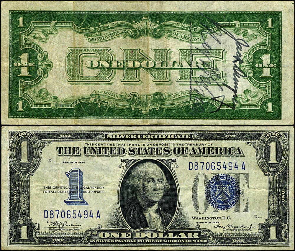 1934 $1 Silver Certificate D-A Block Signed by Jack Dempsey: 1934 $1 Silver Certificate D-A Block Signed by Jack Dempsey This is a 1934 $1 Silver Certificate, FR. 1606, D-A Block, in Very Fine (VF) condition. The note features original paper quality, vibrant co