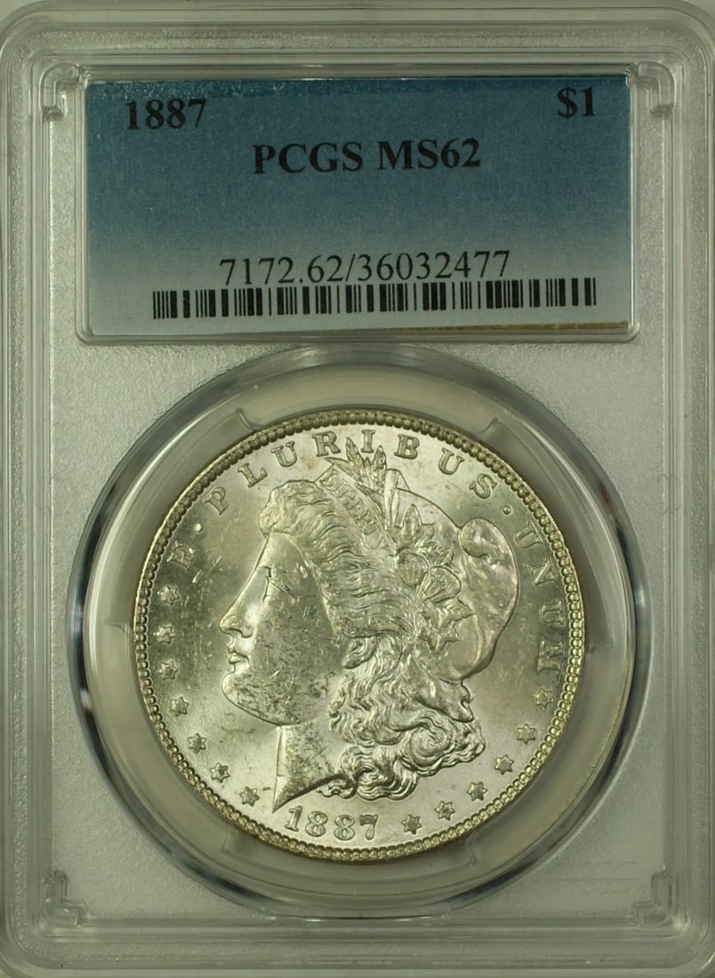 PCGS MS-62 1887 Morgan Dollar Silver $1 Coin Philadelphia Mint: PCGS MS-62 1887 Morgan Dollar Silver $1 Coin Philadelphia Mint This 1887 Morgan Silver Dollar is a $1 coin minted in Philadelphia and certified by PCGS with a grade of MS-62. The coin is composed of s