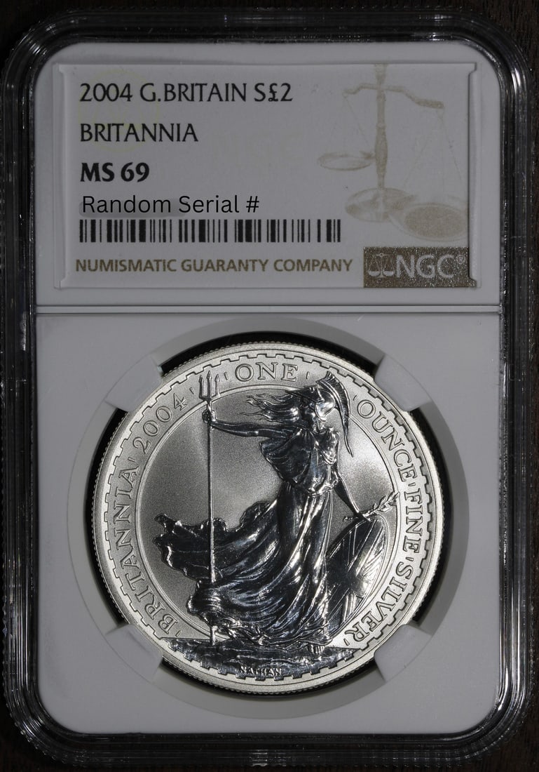 2004 NGC MS69 1 oz Silver Britannia Coin Key Date POP 39: 2004 NGC MS69 1 oz Silver Britannia Coin Key Date POP 39 This stunning 2004 1 oz Silver Great Britain Britannia coin is a remarkable addition for any collector. Graded MS 69 by NGC, it boasts an impre