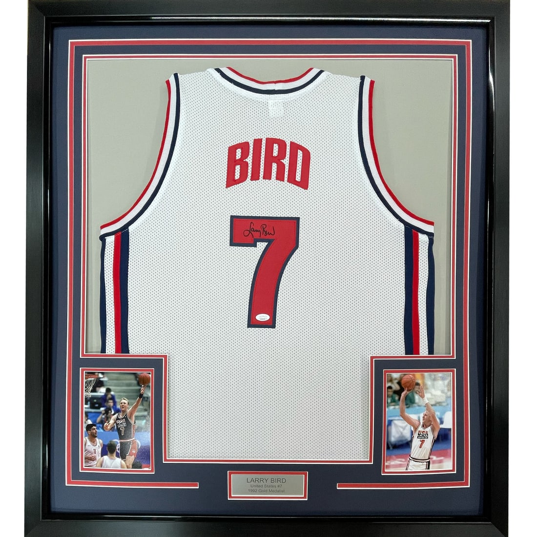 Framed Larry Bird Signed 1992 USA Dream Team Jersey with JSA COA: Framed Larry Bird Signed 1992 USA Dream Team Jersey with JSA COA Celebrate basketball legend Larry Bird with this professionally framed and autographed 1992 USA Dream Team jersey. This original piece