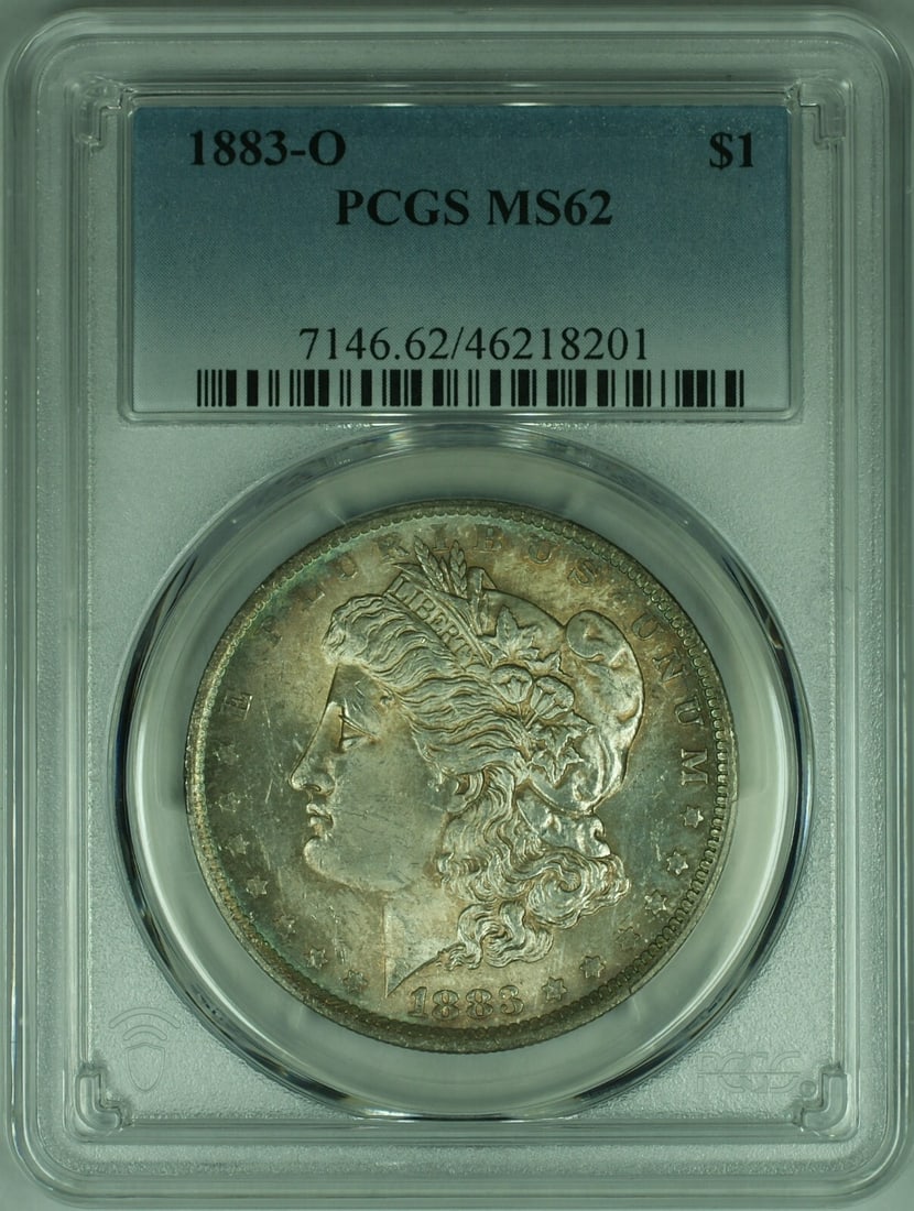 PCGS MS62 1883-O Morgan Dollar New Orleans Silver $1 Coin with Attractive Toning: PCGS MS62 1883-O Morgan Dollar New Orleans Silver $1 Coin with Attractive Toning This 1883-O Morgan Silver Dollar is certified by PCGS with a grade of MS-62. The coin is uncirculated and features attr