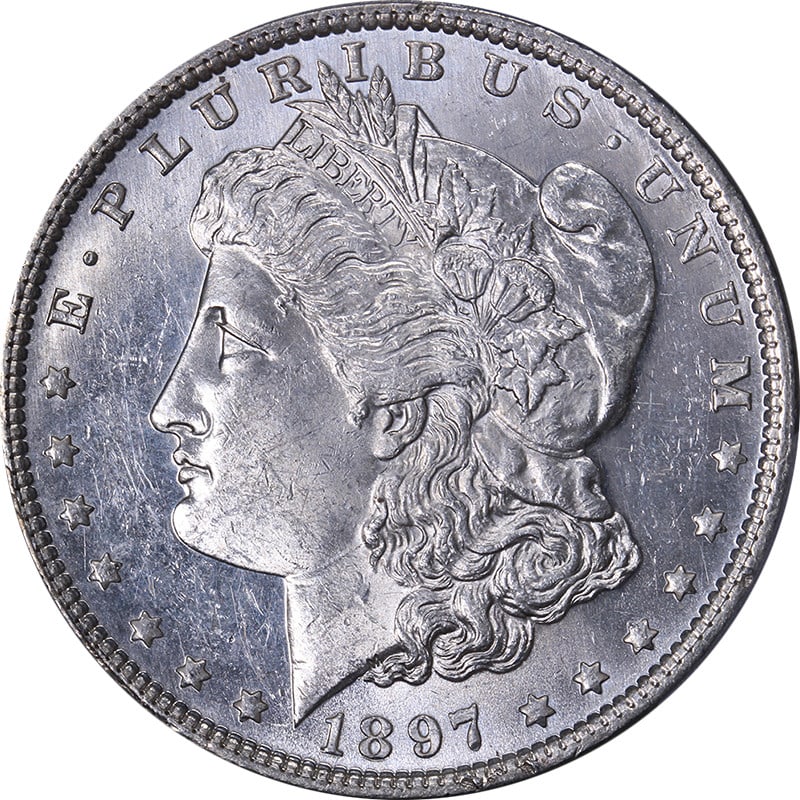 1897-P Morgan Silver Dollar PCGS MS62 PL Strong Strike Silver Coin: 1897-P Morgan Silver Dollar PCGS MS62 PL Strong Strike Silver Coin This 1897-P Morgan Silver Dollar is a stunning piece with excellent eye appeal, showcasing bright white surfaces and impressive luste