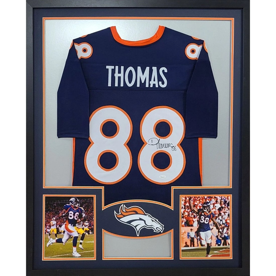 Demaryius Thomas Autographed Denver Broncos Jersey JSA Certified: Demaryius Thomas Autographed Denver Broncos Jersey JSA Certified Capture a piece of sports history with this autographed Demaryius Thomas Denver Broncos jersey. This framed jersey showcases exceptiona