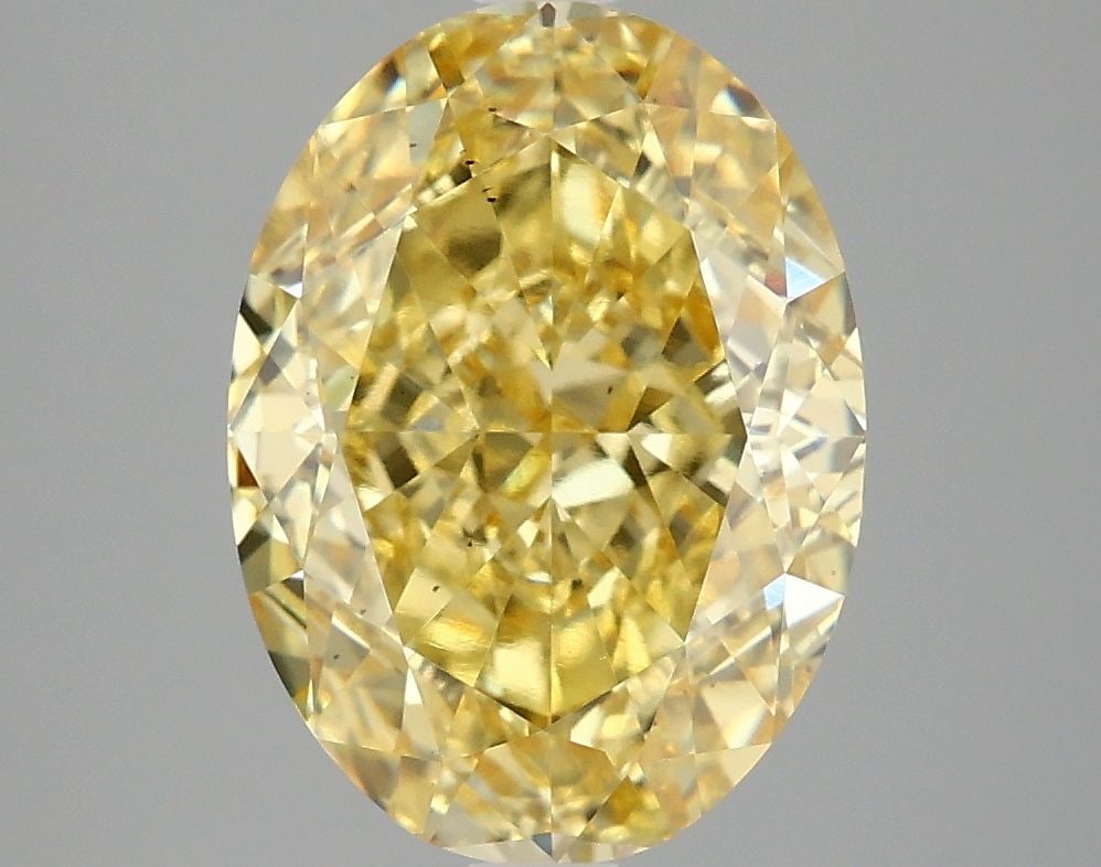 Loose Diamond - OVAL 4.09ct Fancy Vivid Yellow VS2: Loose Diamond - OVAL 4.09ct Fancy Vivid Yellow VS2 Source: This is a real non-mined Diamond that has been grown in a lab Shape: OVAL Carats: 4.09 Color: Fancy Vivid Yellow Certification: IGI Video:
