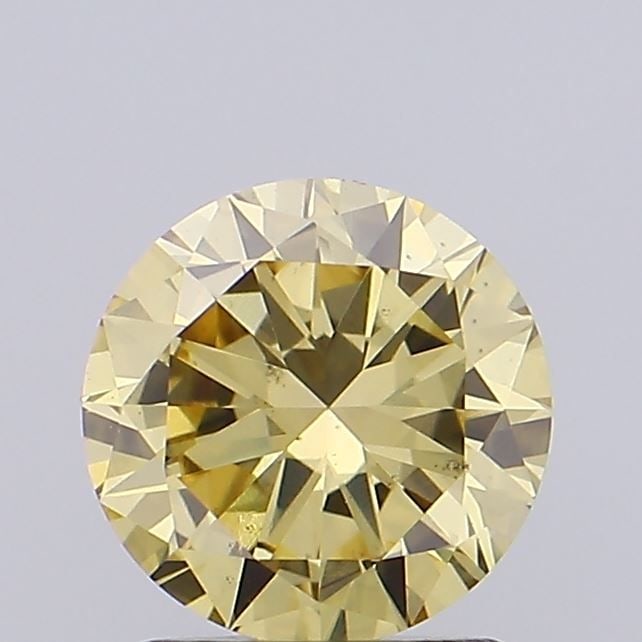 Loose Diamond - ROUND 0.98ct Fancy Vivid Yellow VS2: Loose Diamond - ROUND 0.98ct Fancy Vivid Yellow VS2 Source: This is a real non-mined Diamond that has been grown in a lab Shape: ROUND Carats: 0.98 Color: Fancy Vivid Yellow Certification: NONE Video: