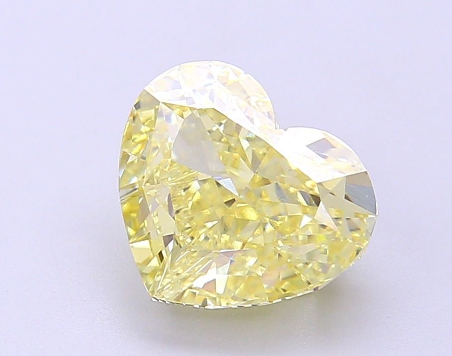 Loose Diamond - HEART 2.06ct Fancy Vivid Yellow VS1: Loose Diamond - HEART 2.06ct Fancy Vivid Yellow VS1 Source: This is a real non-mined Diamond that has been grown in a lab Shape: HEART Carats: 2.06 Color: Fancy Vivid Yellow Certification: NONE Video: