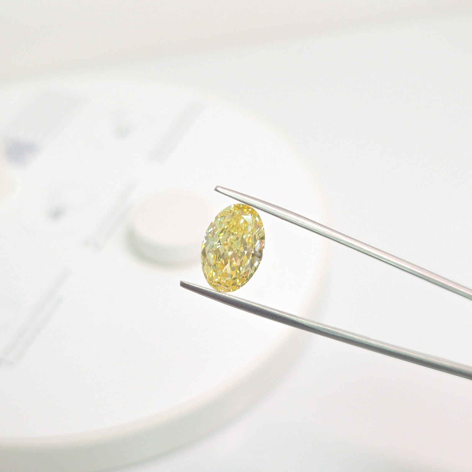 Loose Diamond - OVAL 5.23ct Fancy Intense Yellow VS1: Loose Diamond - OVAL 5.23ct Fancy Intense Yellow VS1 Source: This is a real non-mined Diamond that has been grown in a lab Shape: OVAL Carats: 5.23 Color: Fancy Intense Yellow Certification: IGI Video