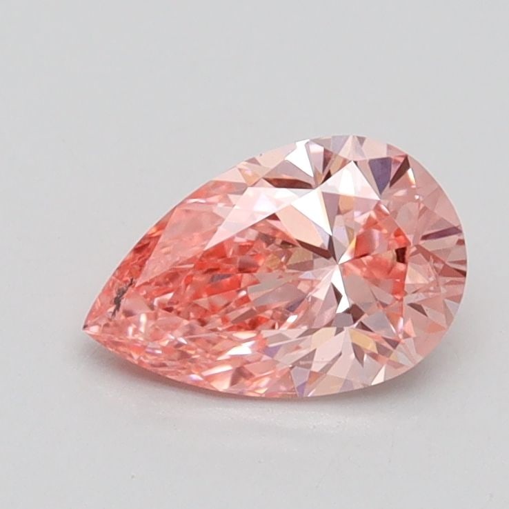 Loose Diamond - PEAR 0.7ct Fancy Vivid Pink VS2: Loose Diamond - PEAR 0.7ct Fancy Vivid Pink VS2 Source: This is a real non-mined Diamond that has been grown in a lab Shape: PEAR Carats: 0.7 Color: Fancy Vivid Pink Certification: IGI Video: