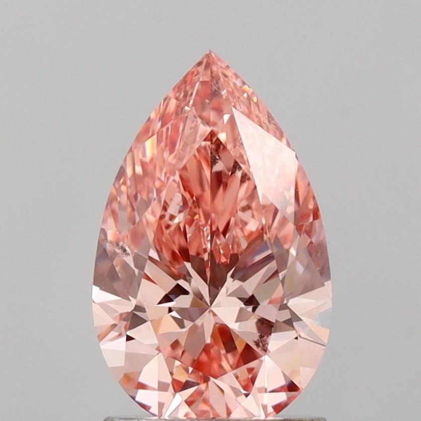 Loose Diamond - PEAR 1.54ct Fancy Vivid Pink VS2: Loose Diamond - PEAR 1.54ct Fancy Vivid Pink VS2 Source: This is a real non-mined Diamond that has been grown in a lab Shape: PEAR Carats: 1.54 Color: Fancy Vivid Pink Certification: IGI Video: